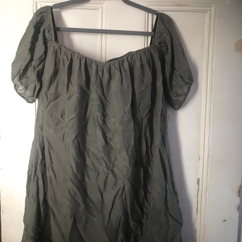 Green off the shoulder Bebe dress, new with tags.